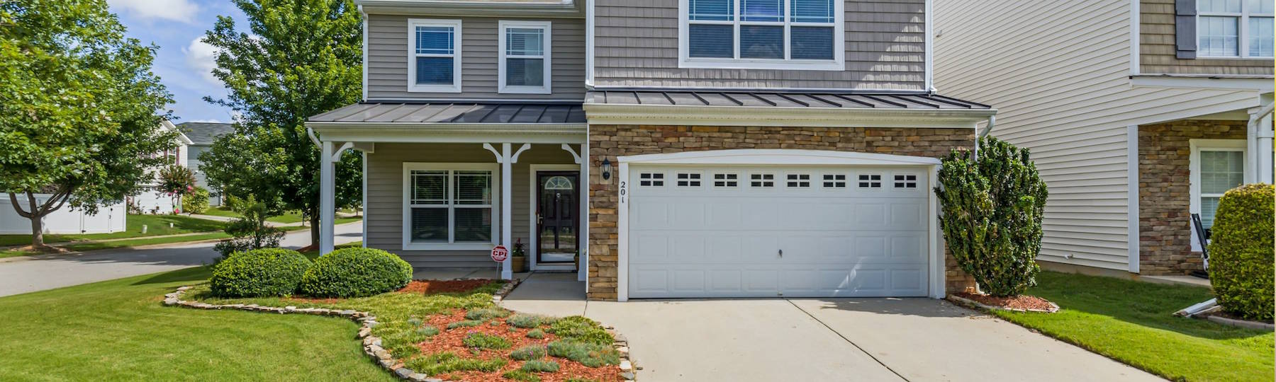 police vehicle with lights on near construction zone